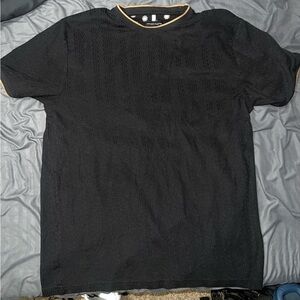 Black Shirt with Gold Accents